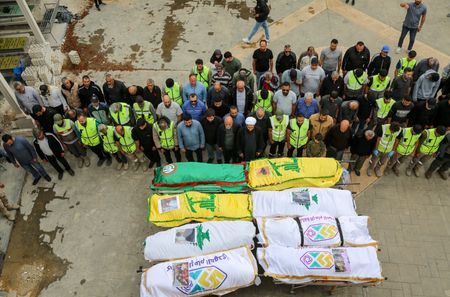 Funeral of people killed by an Israeli strike, in Deir