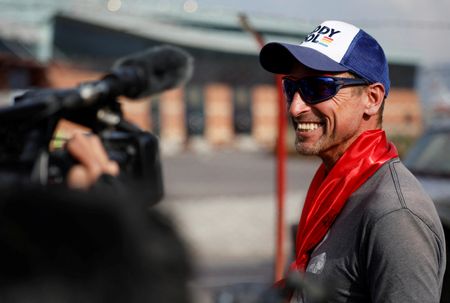 British climber Kenton Cool returns after completing his 17th ascent