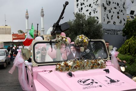 Iran propaganda push seeks to project unity despite internal divisions
