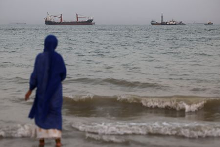 Vessels in the Strait of Hormuz are visible near the