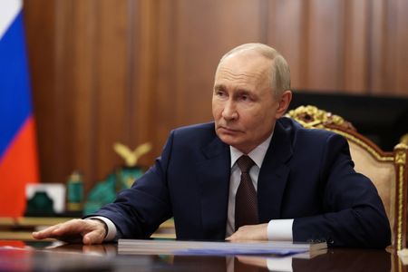 Russian President Vladimir Putin meets with Governor of the Omsk