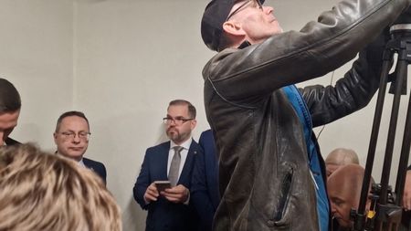 People gather inside a shelter at the Lithuanian parliament after
