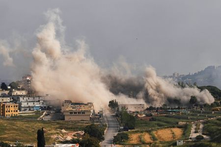 Smoke billows following an Israeli strike in Nabatieh