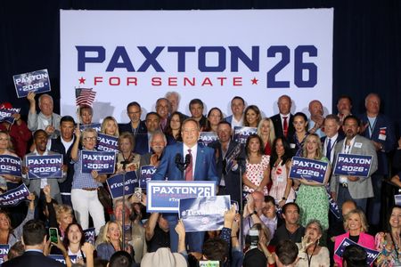 Texas Attorney General Ken Paxton speaks to supporters after winning