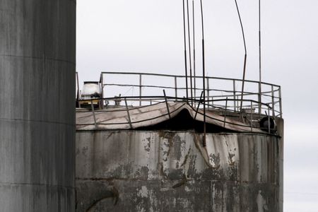 FILE PHOTO: Damage to oil tanks after drones crashed at