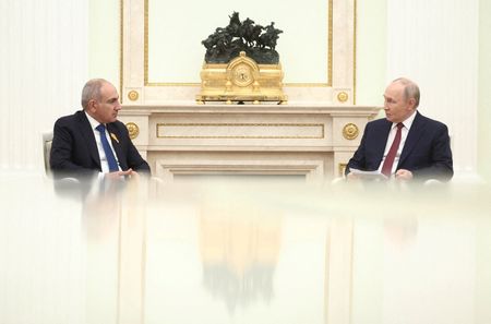 FILE PHOTO: Russian President Putin and Armenian Prime Minister Pashinyan