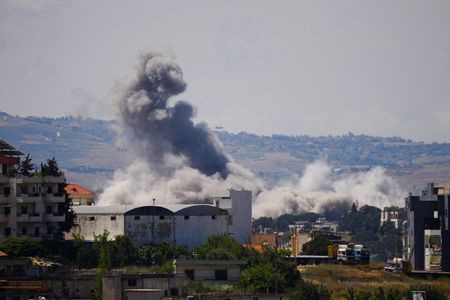 Smoke billows following an Israeli strike as seen from Nabatieh