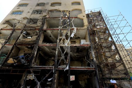 A residential building damaged by a strike on March 4,