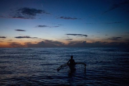 FILE PHOTO: China patrols Scarborough Shoal after Philippines warns of