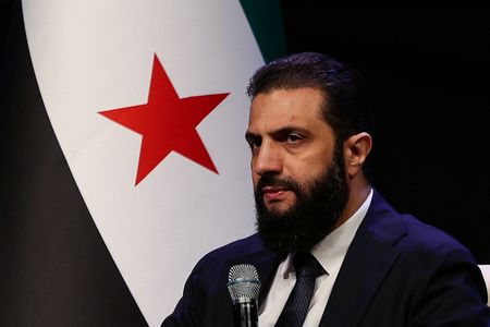 Syrian President al-Sharaa attends the Ministry of Awqaf conference titled