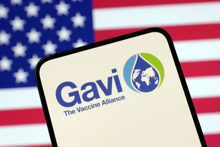 Illustration shows The Vaccine Alliance (GAVI) logo and U.S. flag