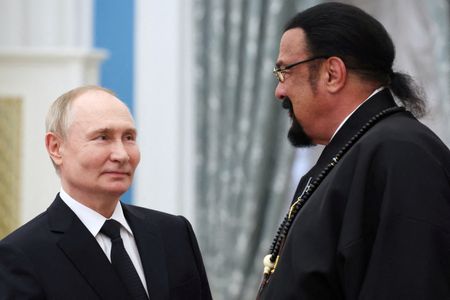 FILE PHOTO: Russia's President Putin presents state awards during a