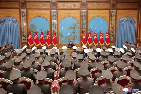 North Korean leader Kim Jong Un meets with division and