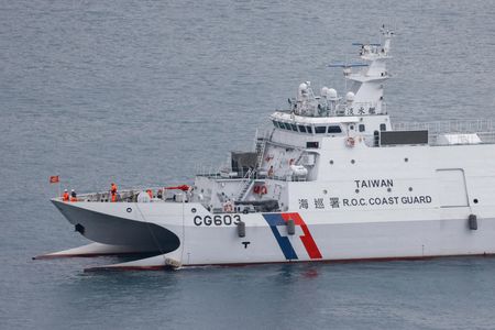 A Taiwan Coast Guard patrol vessel moves in Keelung, as