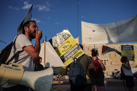 Activists protest as Greek parliament votes on quicker deportation of