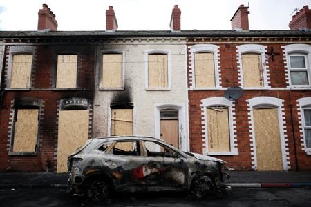 Knife attack victim’s family calls for calm after anti-immigrant violence in Belfast