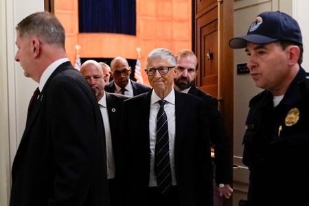 Bill Gates departs following a closed door interview before the