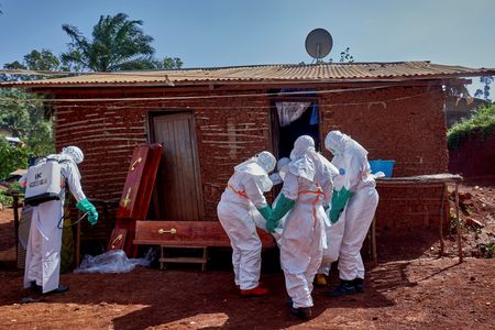 A cracked coffin, a funeral and the hunt for Ebola's