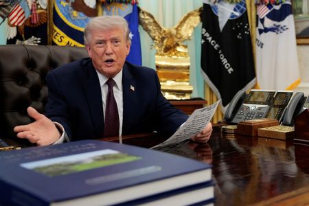 U.S. President Trump signs an executive order in the Oval
