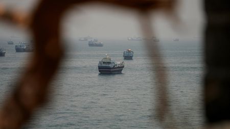 Vessels are anchored in the Strait of Hormuz, as seen