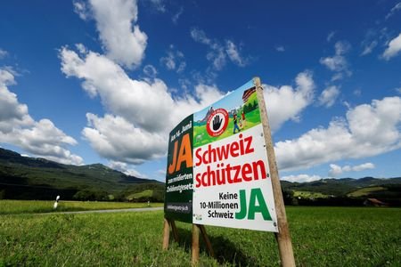 Swiss vote on proposal to cap population at 10 million