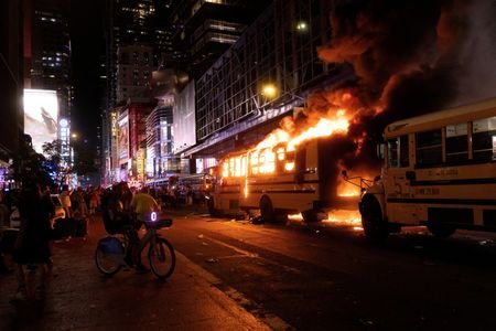 Knicks fans watch as World Cup shuttle burns outside Port