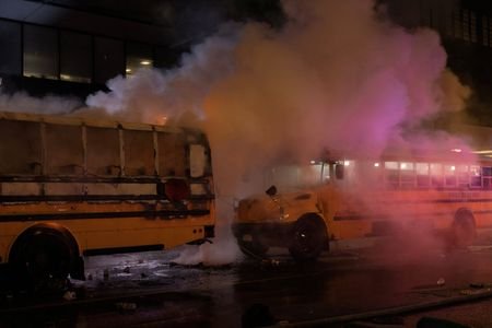 World Cup bus set alight as chaotic celebrations erupt in Manhattan after Knicks win