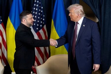 FILE PHOTO: Ukrainian President Volodymyr Zelenskiy meets U.S. President Donald