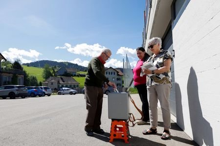 Swiss vote on proposal to cap population at 10 million