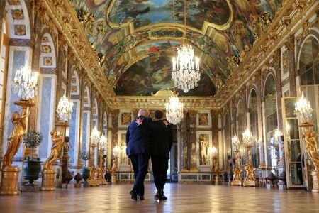 U.S. President Donald Trump receives a tour of Chateau de