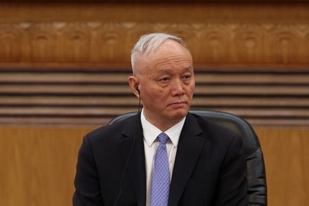 Chinese Politburo Standing Committee member Cai Qi attends a meeting