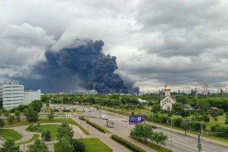 Smoke rises from an oil refinery following a Ukrainian drone