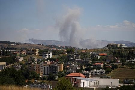 Smoke billows from southern Lebanon following an Israeli strike, as