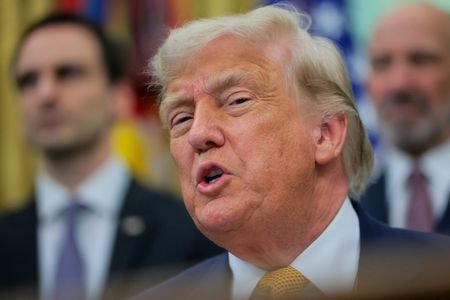 U.S. President Trump signs an executive order in the Oval