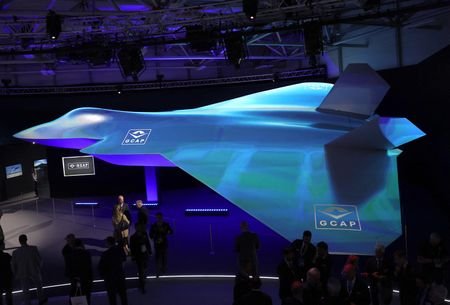 Attendees view GCAP concept fighter plane at the BAE Systems