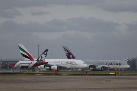 Emirates and Qatar Airways planes at Sydney Kingsford Smith Airport,