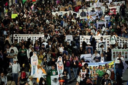 Families of the disappeared rally near Mexico City stadium before