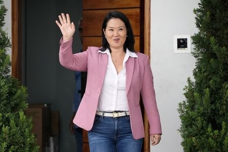 Keiko Fujimori outside her home after narrowly winning Peru's presidential