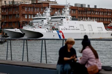 FILE PHOTO: Taiwan Coast Guard patrol vessels are stationed in