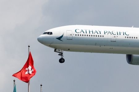 FILE PHOTO: A Cathay Pacific Boeing 777 plane lands at