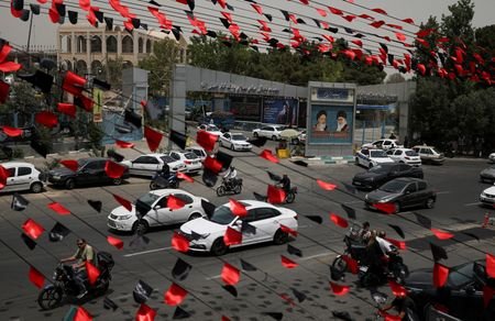 Iranians prepare for a farewell ceremony for late Supreme Leader