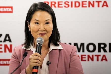 Keiko Fujimori addresses media after narrowly winning Peru's presidential election,