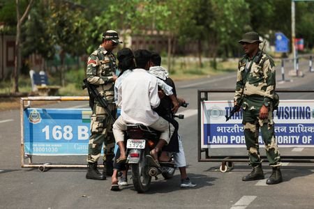 FILE PHOTO: Border Security Force (BSF) personnel make securtiy checks