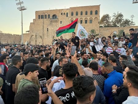 FILE PHOTO: Demonstrators demand the overthrow of the Libya's Government
