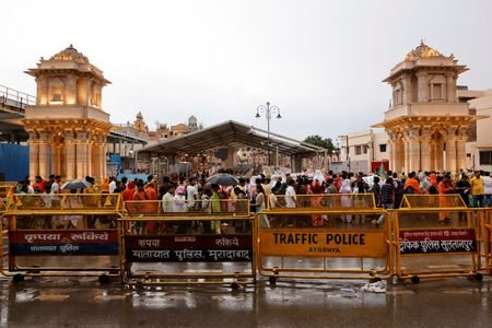 Hindu devotees wait to enter the Hindu god Lord Ram