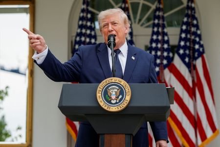 U.S. President Donald Trump participates in a Rose Garden Club