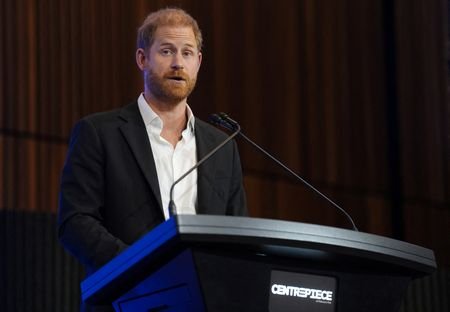 Britain's Prince Harry and Meghan, the Duke and Duchess of