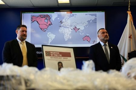 U.S. and Canadian law enforcement officials announce federal charges and