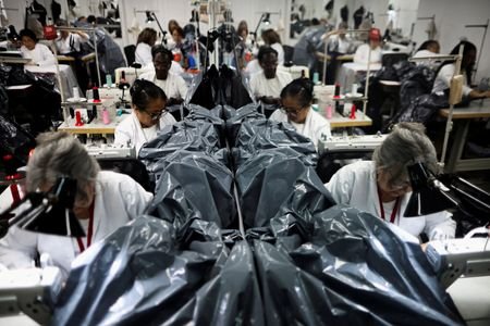 Venezuelan workshop sews body bags in the aftermath of the