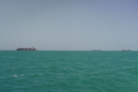 FILE PHOTO: Cargo ships sail in Saudi waters near the
